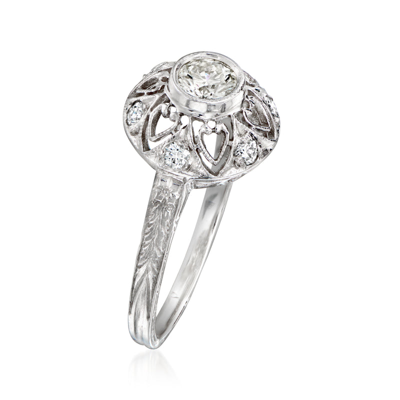 14kt white gold diamond filigree ring side view with round center stone