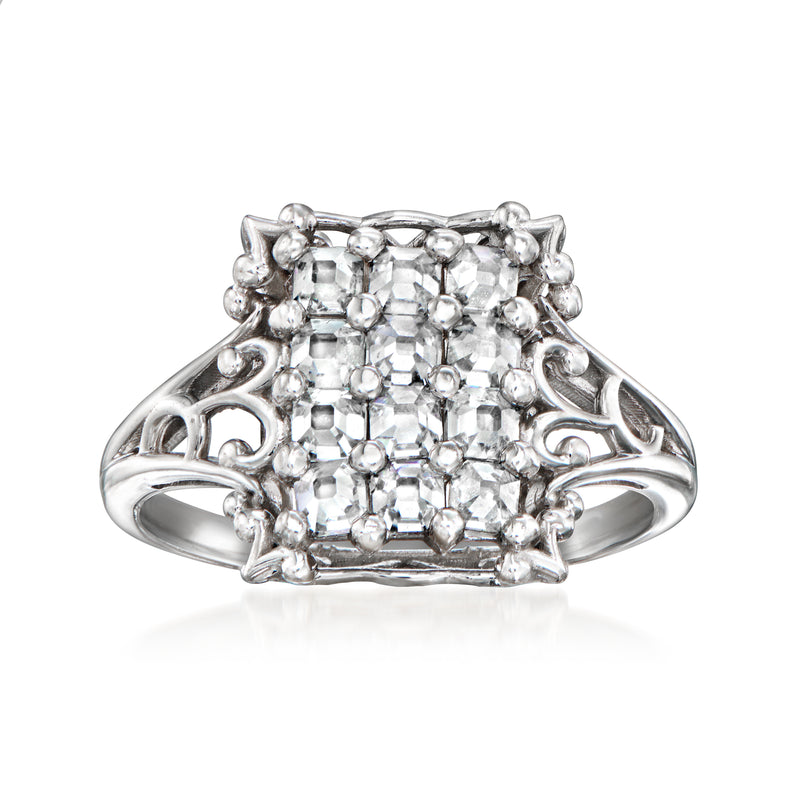 Vintage diamond cluster ring in white gold with square halo cluster and ornate side scrollwork