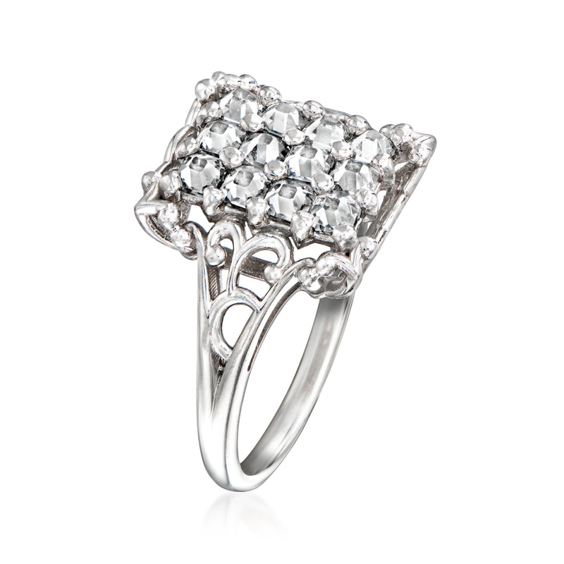 White gold diamond cluster ring with stacked square stones and openwork side detailing