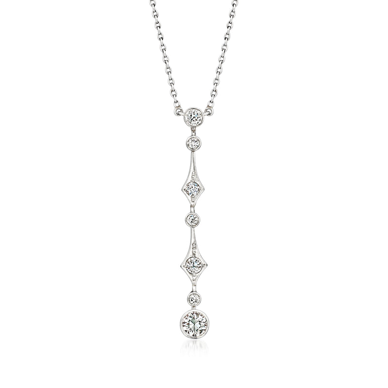 Vintage diamond drop necklace with alternating round diamonds on a fine chain