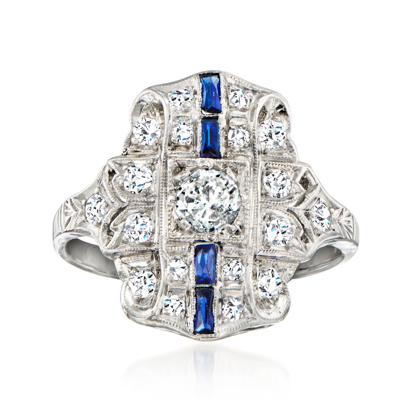 Vintage diamond ring with blue sapphire accents in white gold and platinum