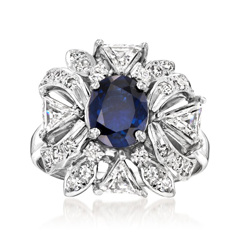 Blue sapphire and diamond cluster ring in white gold, vintage-style setting