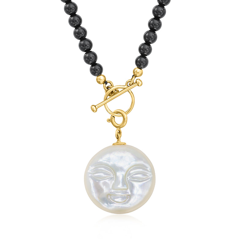 Moon charm pendant with white mother-of-pearl face on black beaded necklace, gold fittings