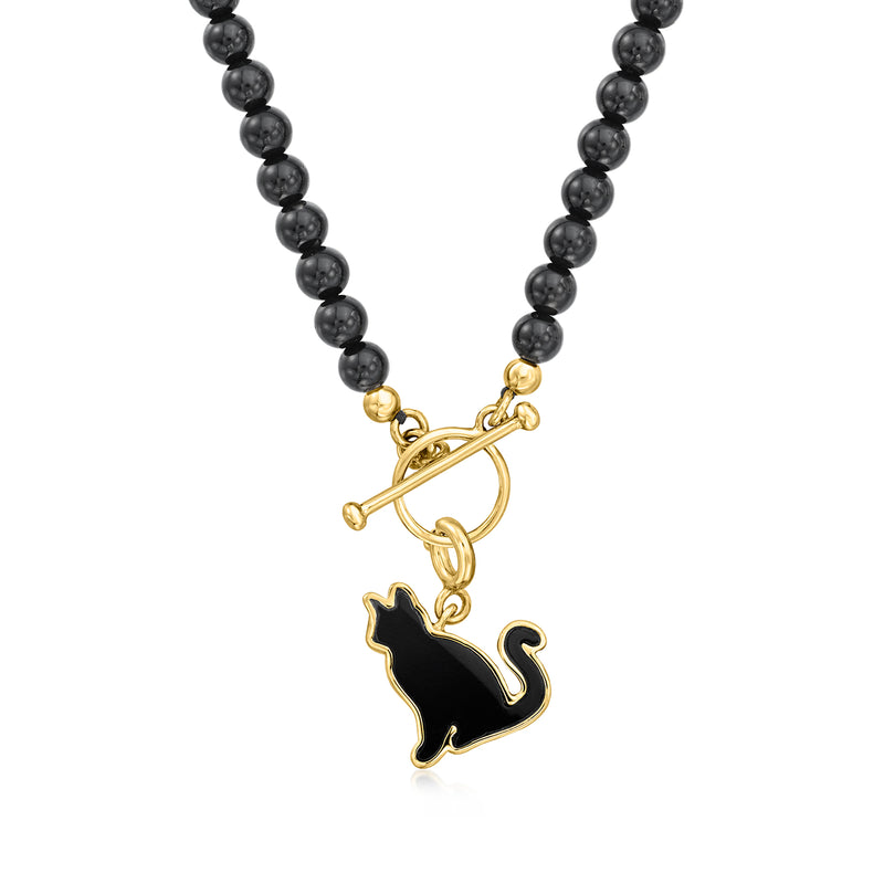 Cat charm pendant on black bead necklace with gold-tone bow-like clasp