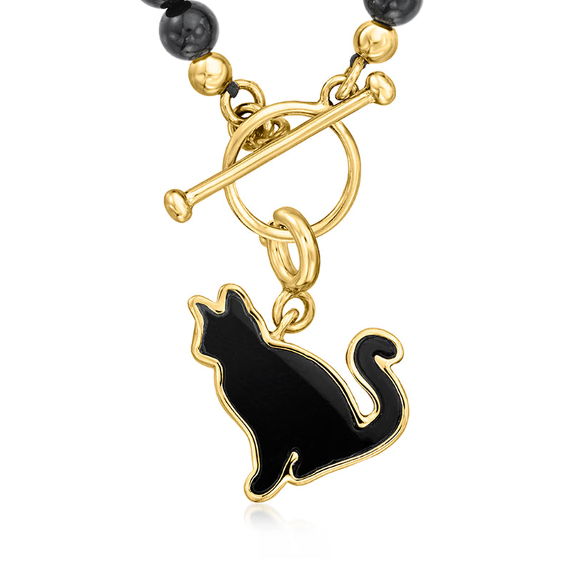 Black onyx cat charm pendant on gold-tone chain with bar and bead accents