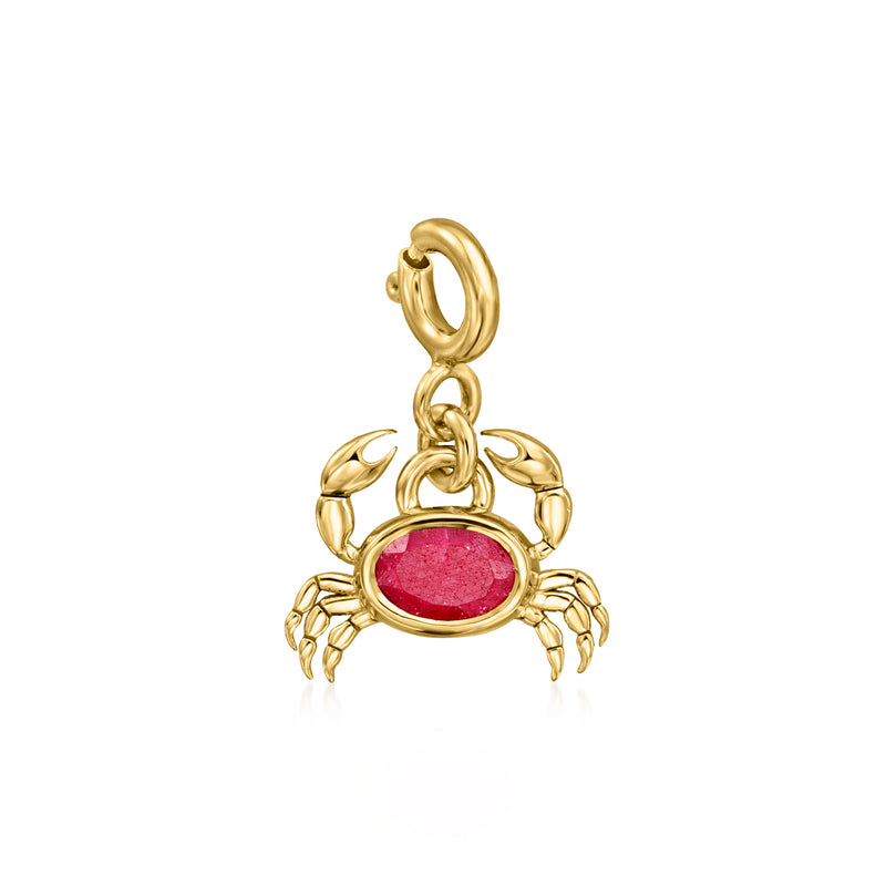 Gold crab charm with oval red ruby stone centerpiece and detailed claws