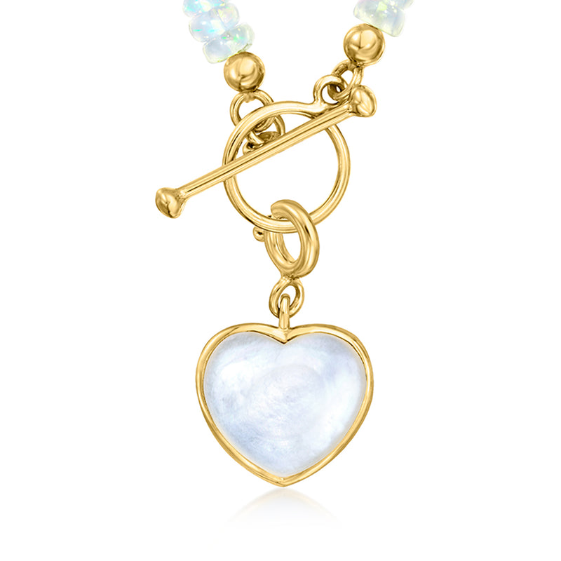 Gold over sterling heart charm with mother-of-pearl heart, front view with loop details