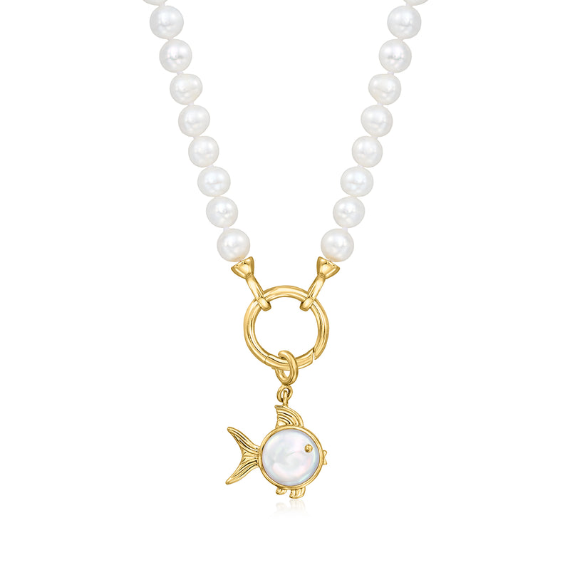Gold necklace with white pearls and dangling fish charm with coin pearl