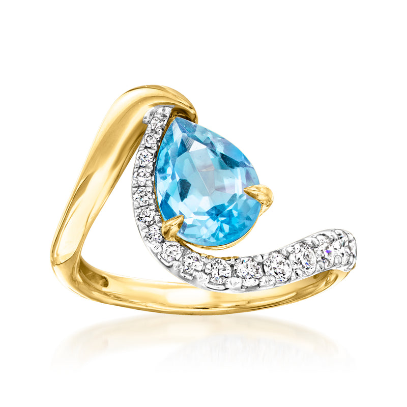Swiss blue topaz ring with diamond accents in gold over sterling