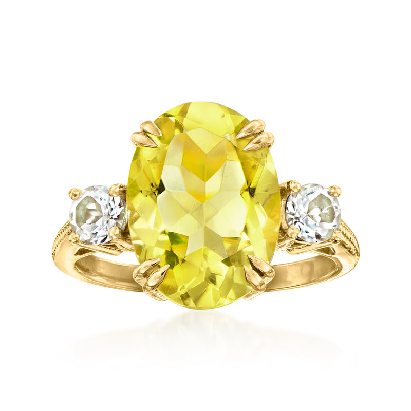 Oval lemon quartz ring with white topaz accents, 18kt gold over sterling band.