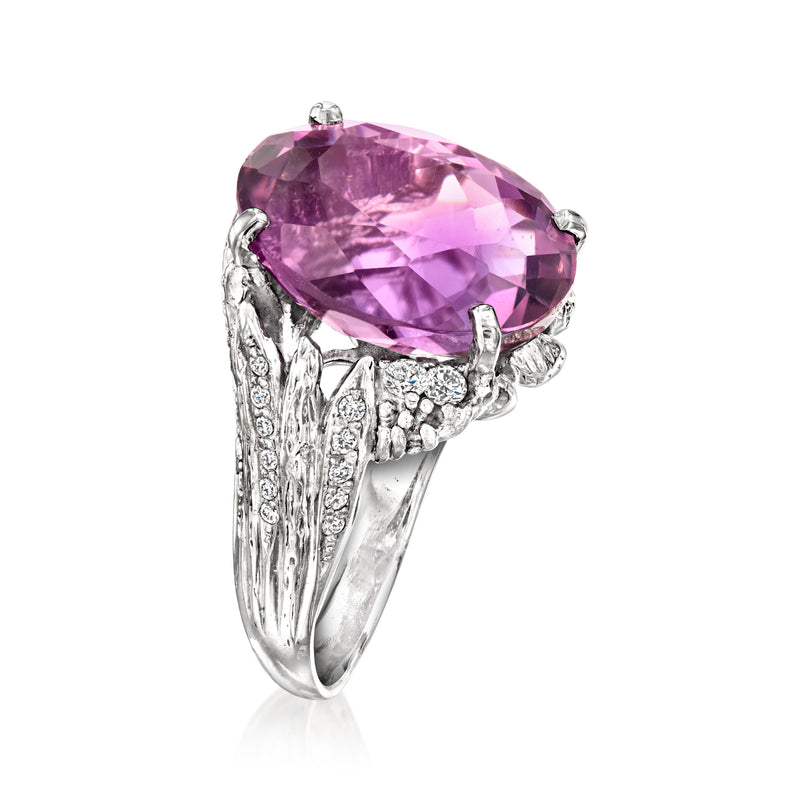 Platinum oval amethyst ring with diamond-set shoulders and four-prong setting