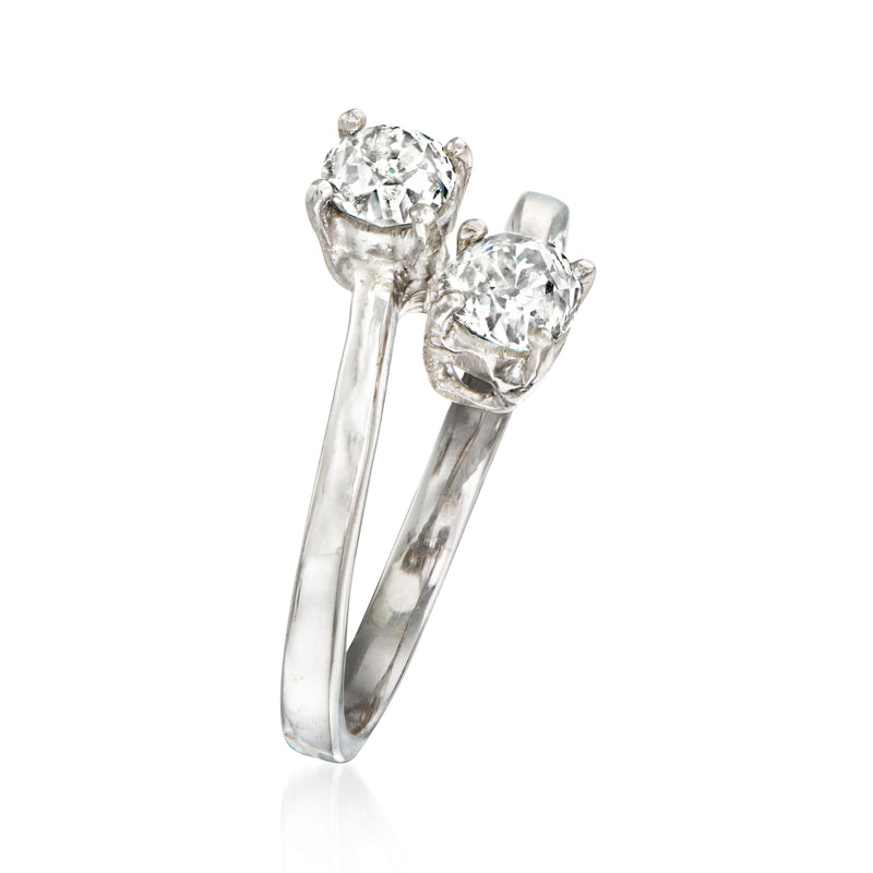 Bypass diamond ring with two round center stones on 18kt white gold band