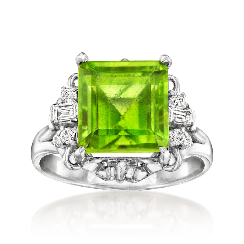 Platinum vintage ring with large square peridot center and diamond side accents