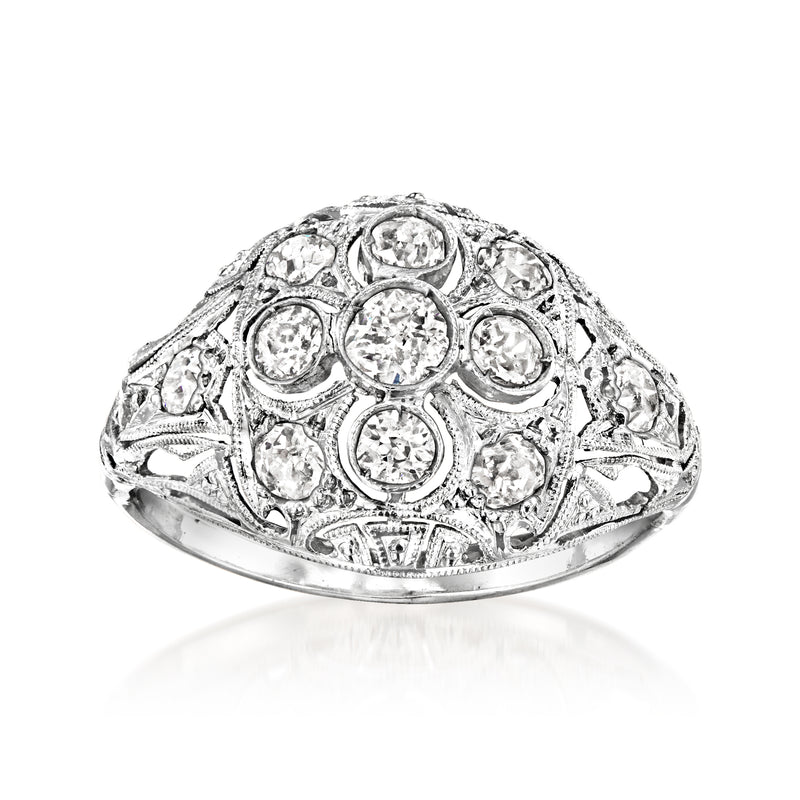 Platinum and 14kt white gold diamond filigree ring with ornate round settings