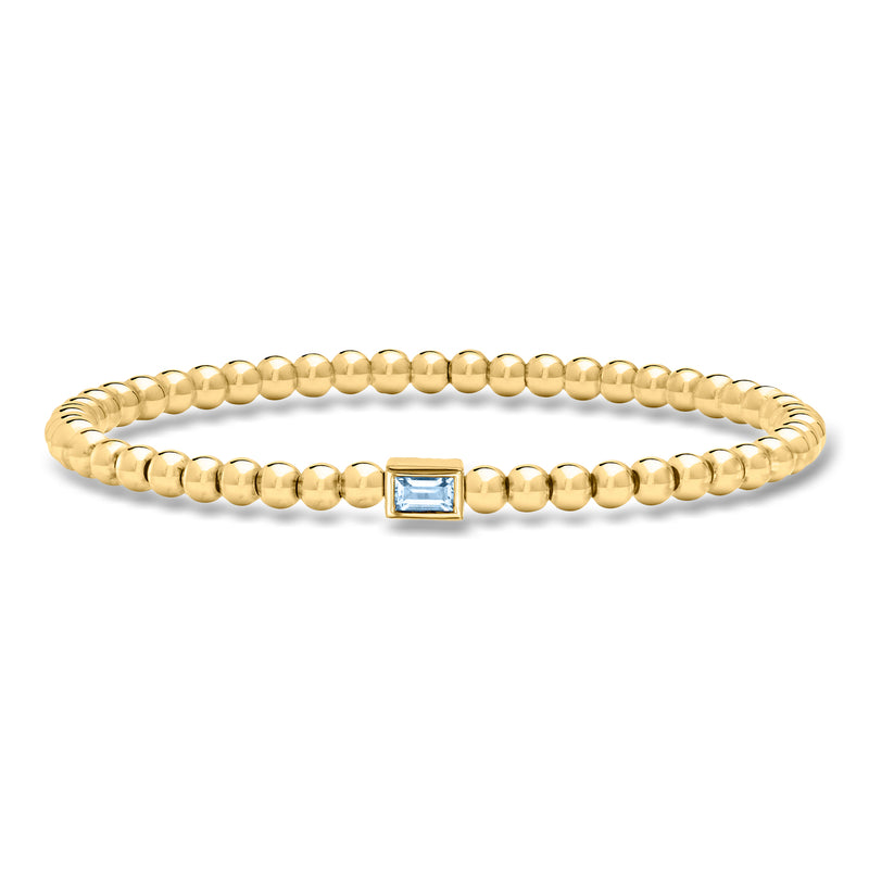 Gold over sterling bead stretch bracelet with aquamarine-toned square gemstone center