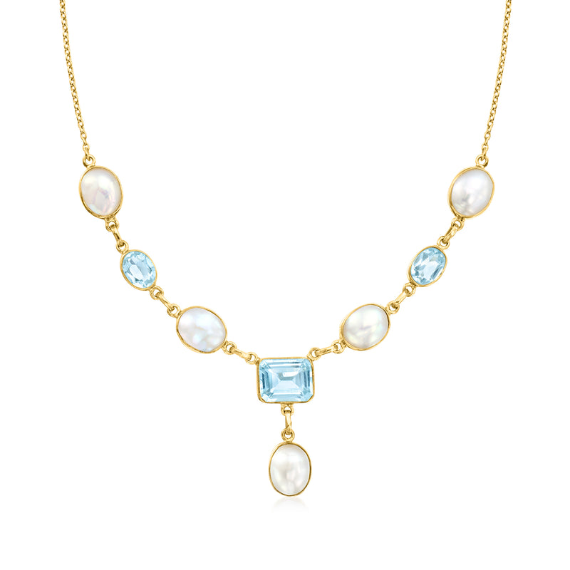 Gold over sterling necklace with round cultured pearls and sky blue topaz center