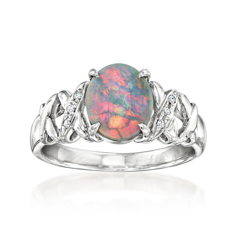 Vintage oval black opal ring with diamond accents in platinum prong setting