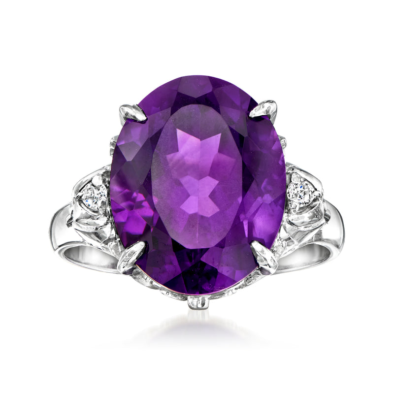 Platinum ring with large purple amethyst center and diamond accents, vintage oval setting