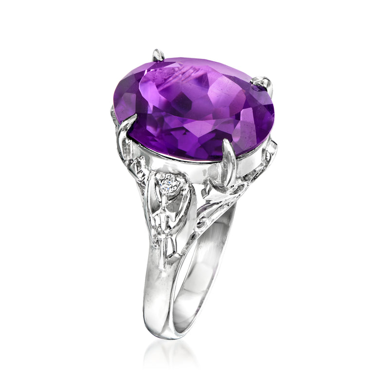 Platinum ring with oval amethyst gemstone and claw prongs, with diamond details