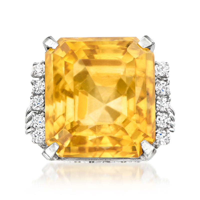 Platinum vintage ring with square yellow citrine center and diamond side stones