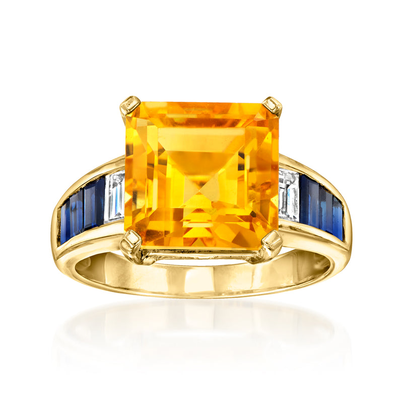 18kt yellow gold ring with large yellow citrine center and blue sapphire side accents