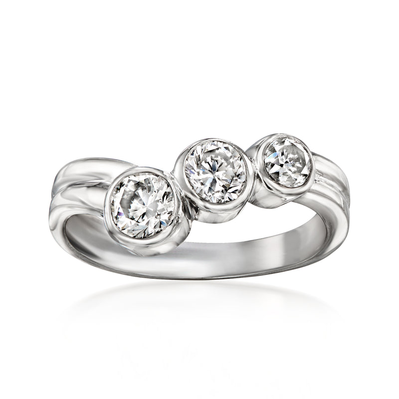 Platinum three-stone diamond ring with three round center stones