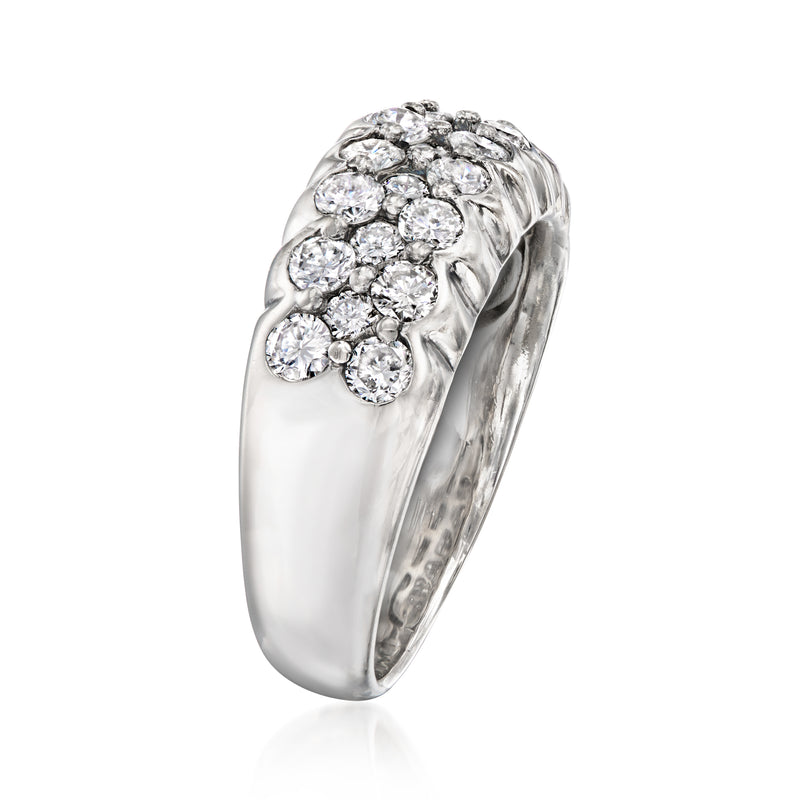 Platinum three-row diamond ring, side view with cluster of round brilliant diamonds
