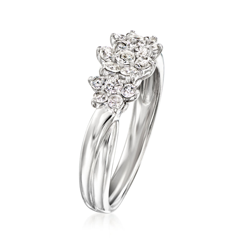 Platinum diamond cluster ring with stacked round stones and curved shank side view