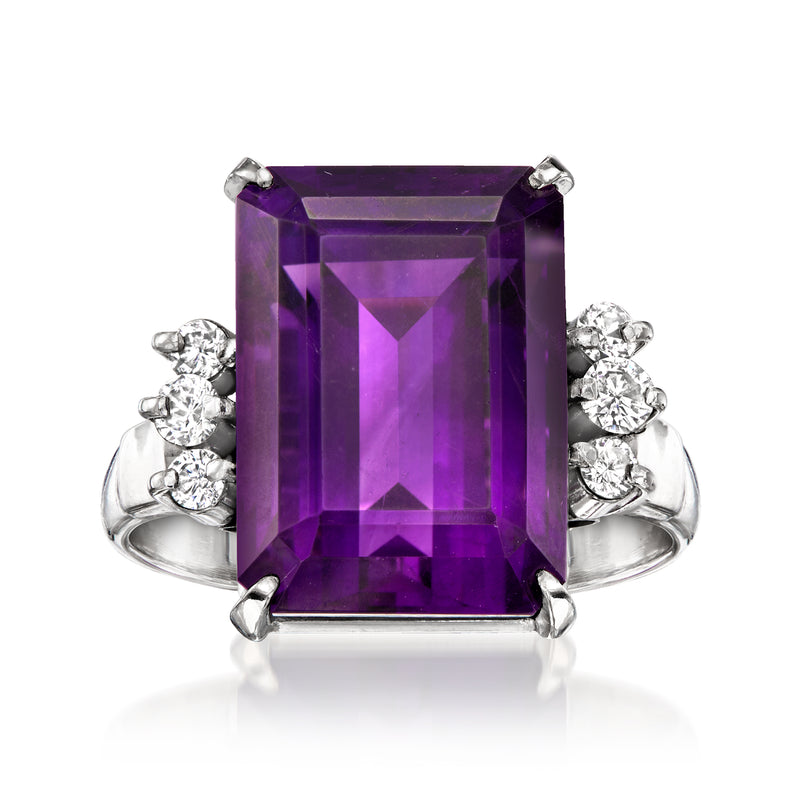 Platinum vintage ring with large purple amethyst center and diamond side clusters