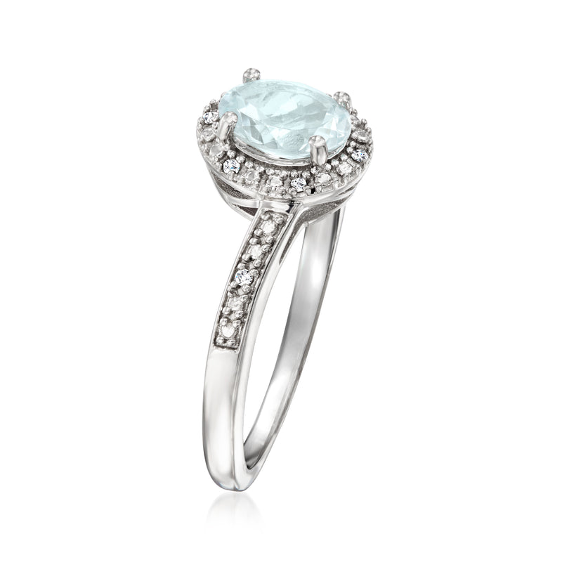 Aquamarine and diamond sterling silver ring with oval halo setting