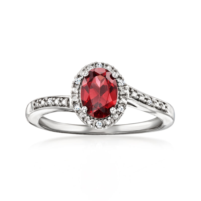 Garnet ring in sterling silver with oval red stone and diamond halo