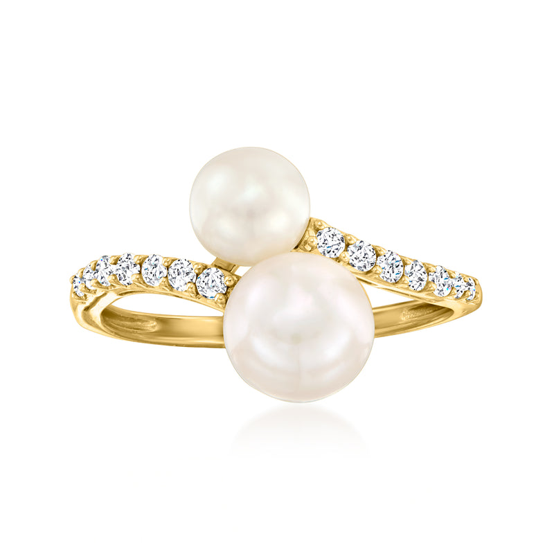 14kt yellow gold bypass ring with two cultured pearls and diamond accents