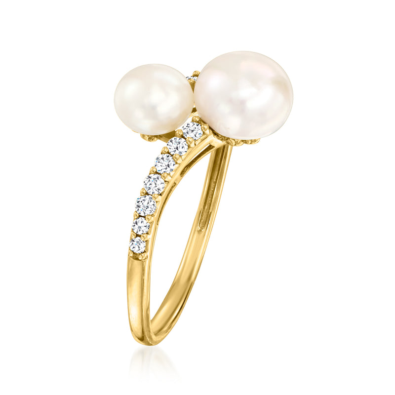 14kt yellow gold bypass ring with two cultured pearls and diamond accents