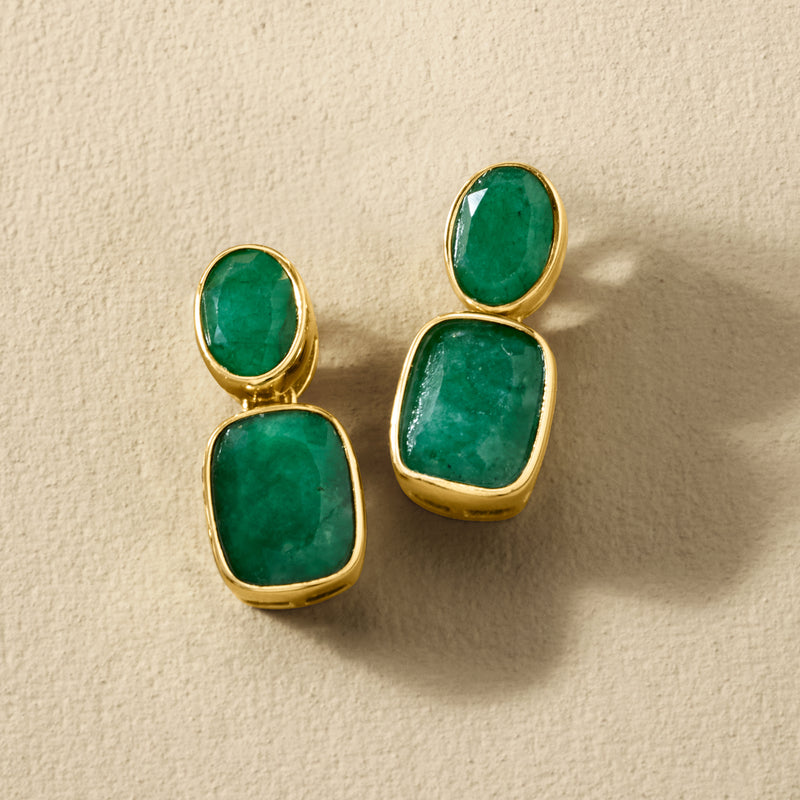Gold drop earrings with two emerald-green stones per earring, oval and rectangular shapes