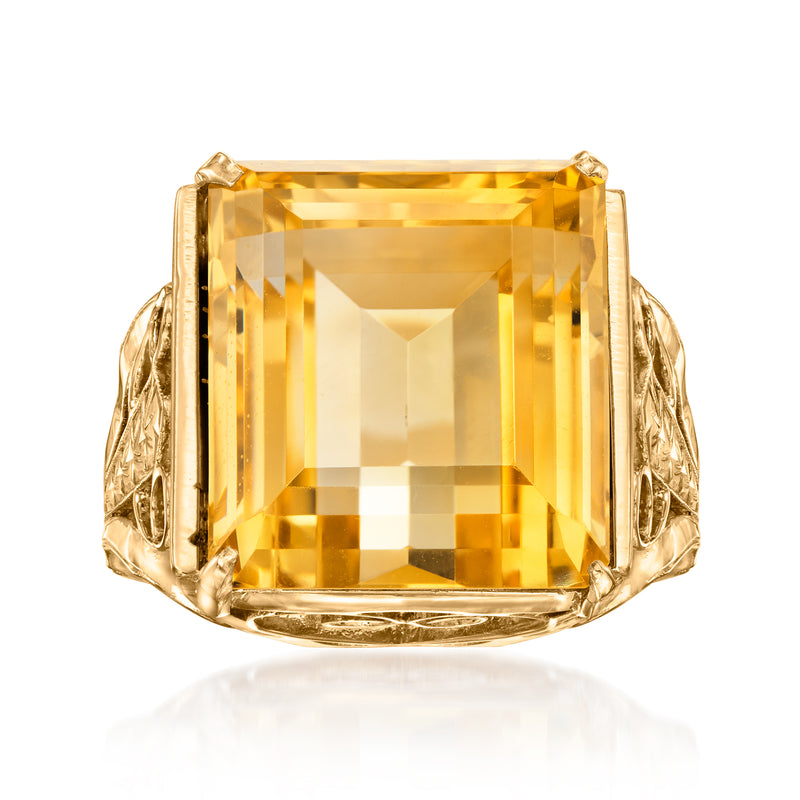 Vintage 18kt yellow gold ring with large emerald-cut citrine gemstone, ornate side settings