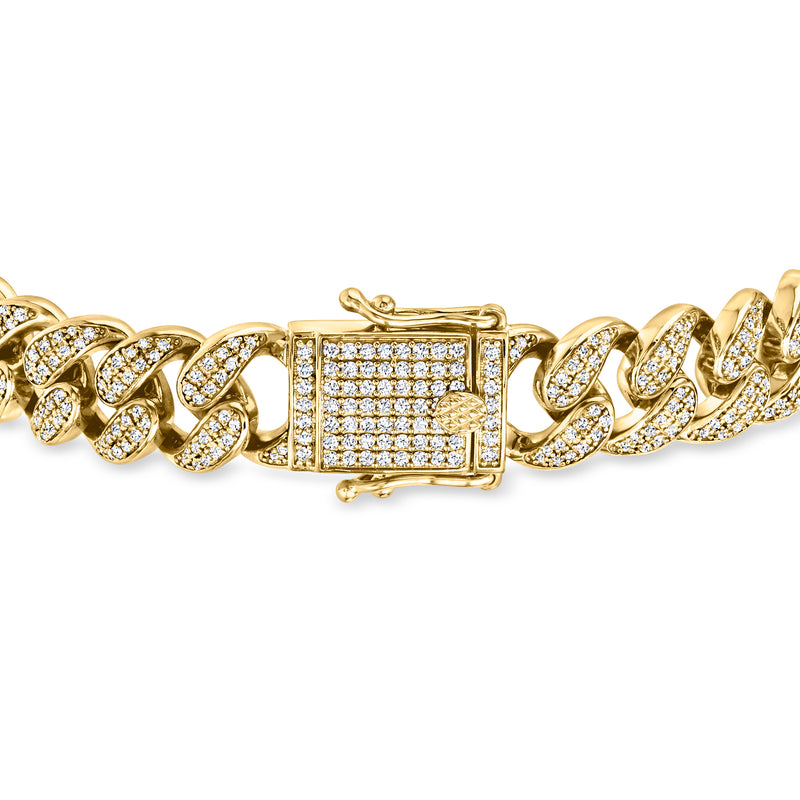Gold Cuban-link bracelet with rectangular diamond center plaque and prong-set side stones