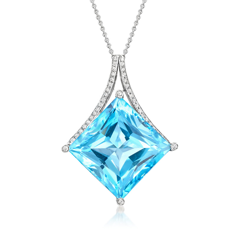 Blue topaz pendant necklace in white gold with diamond accents and chain