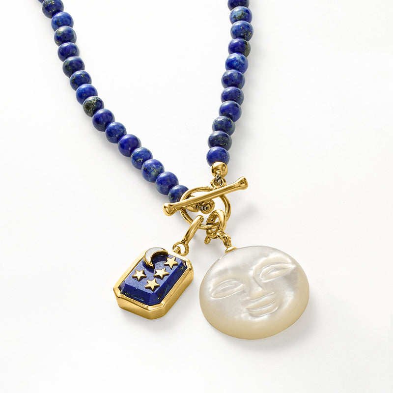 Gold-tone lapis octagon moon-and-star charm on blue beads with round mother-of-pearl charm