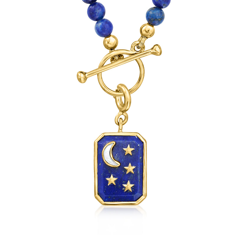 Gold-tone lapis octagon charm with mother-of-pearl moon and stars on blue beads