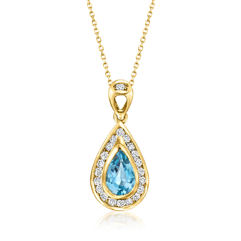 18kt yellow gold teardrop aquamarine pendant with diamond halo and chain necklace
