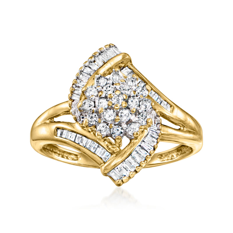 Vintage yellow gold diamond cluster ring with round stones and channel-set accents