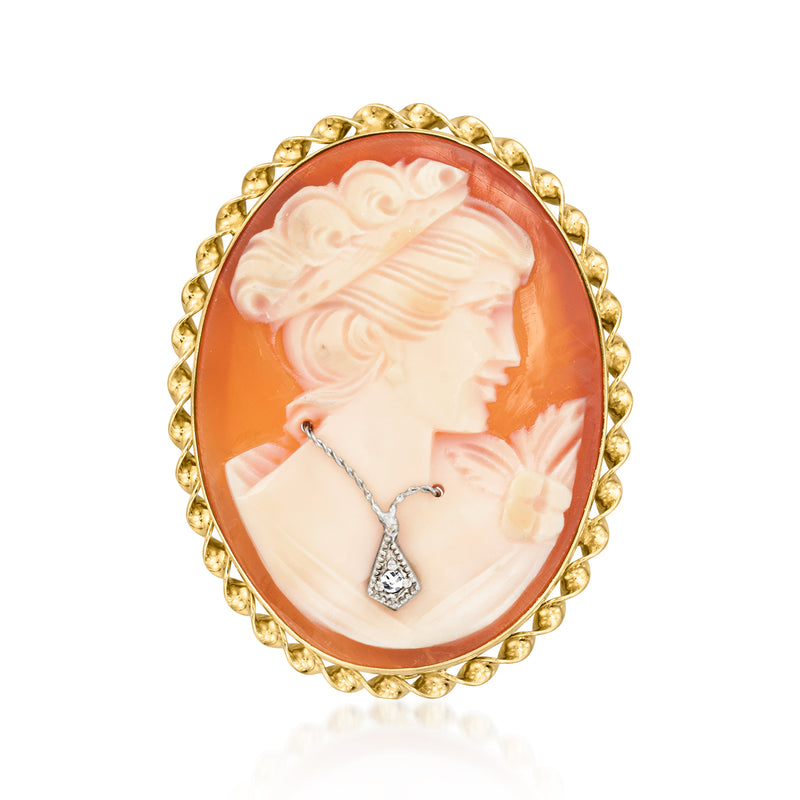 Oval cameo pendant in 14kt yellow gold with orange shell portrait and diamond detail