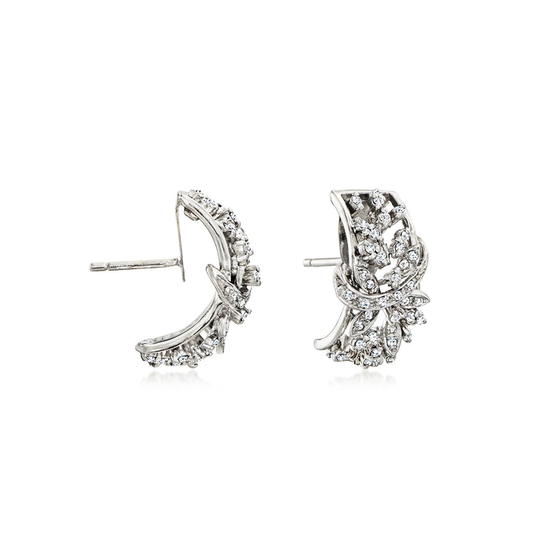Curved diamond post earrings in white gold with ornate openwork detailing