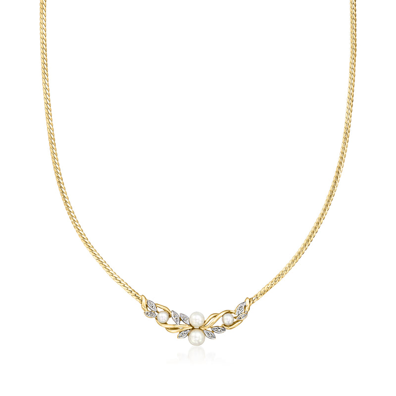 Cultured pearl and diamond necklace in 14kt yellow gold, flower clasp