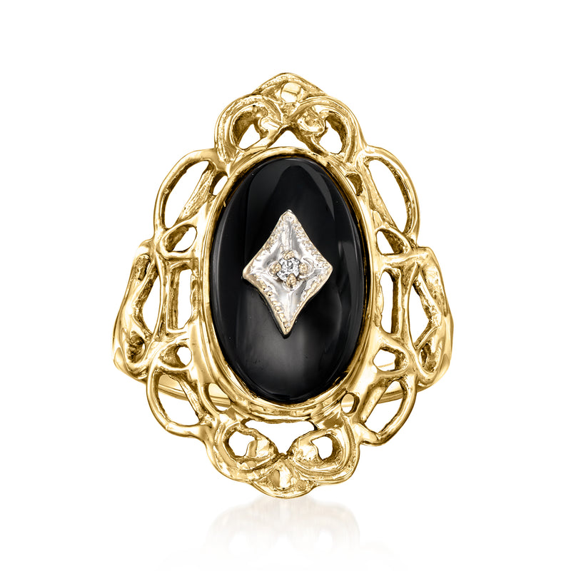 Vintage onyx ring in 10kt yellow gold with oval black stone and single diamond accent