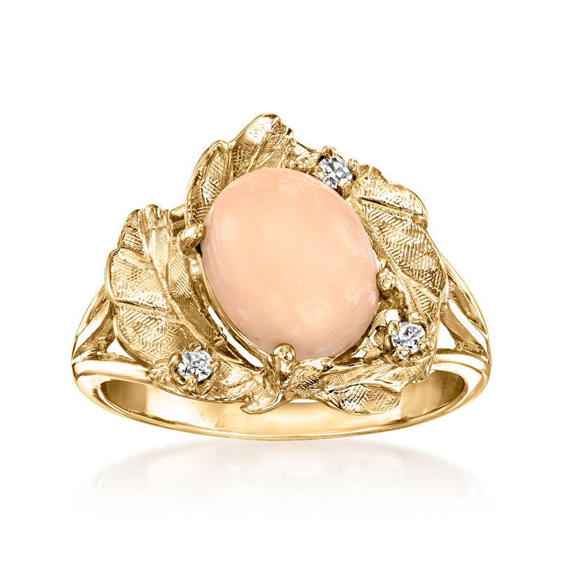 Vintage coral leaf ring in 14kt yellow gold with oval pink cabochon and diamond accents
