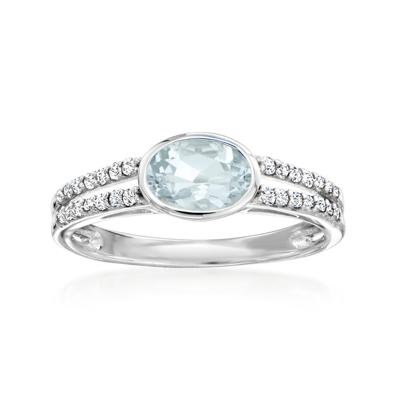 Two-row 14kt white gold ring with oval aquamarine center and diamond accents