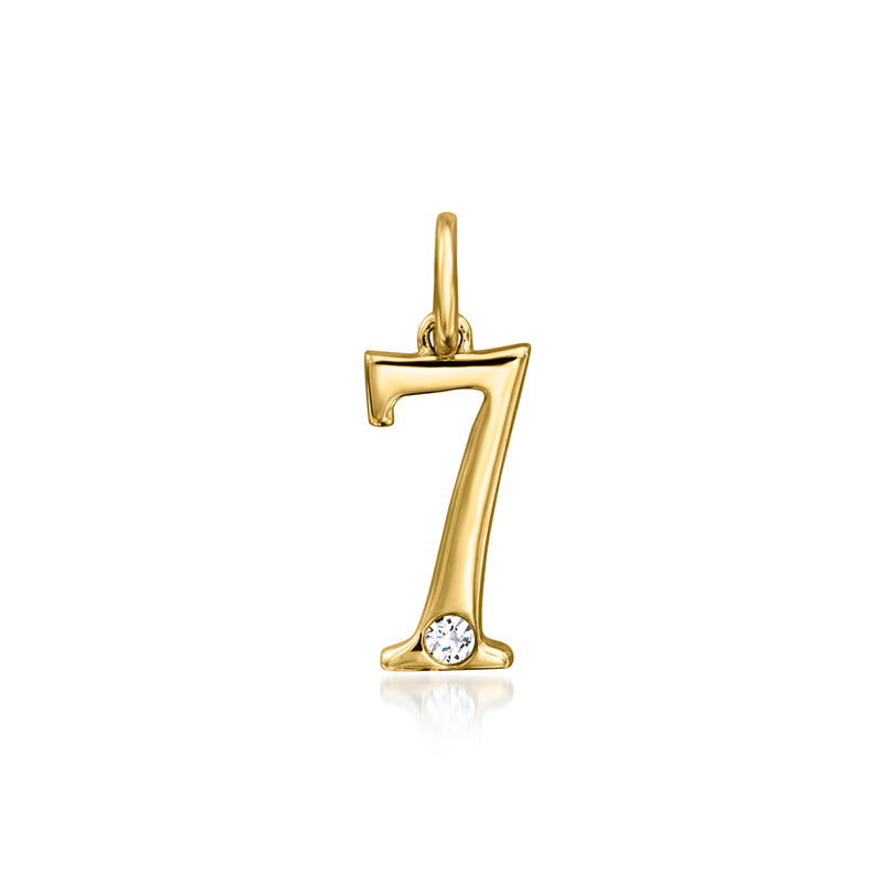 14kt yellow gold number 7 charm with a single round diamond accent