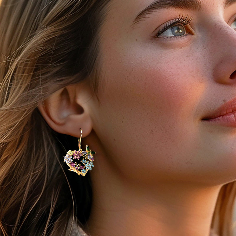 Gold leverback earrings with multicolor gemstone heart drop design