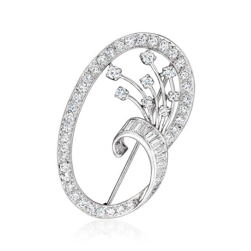 Vintage platinum diamond swirl pin with oval frame and floral spray design